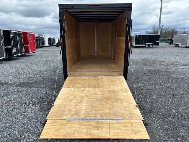 Homesteader-7-x-14-Enclosed-Cargo-Trailer-V-Nose-Ramp-Door-Added-Height-Blackout-Package-OHV-6.webp Homesteader 7 x 14 Enclosed Cargo Trailer – Black Trim OHV - Image 5